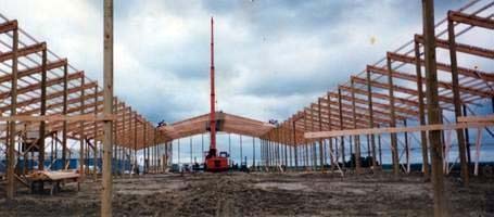 Wisconsin barn under construction with engineered dimension rafters