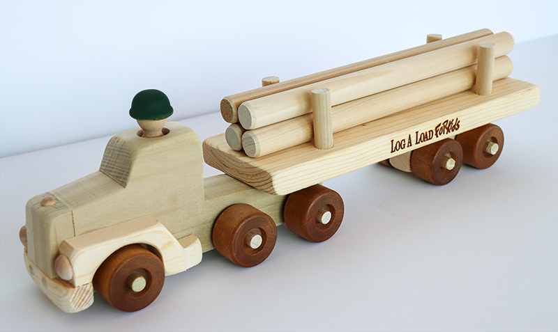 Wooden log truck toy with "Log a Load for Kids" logo